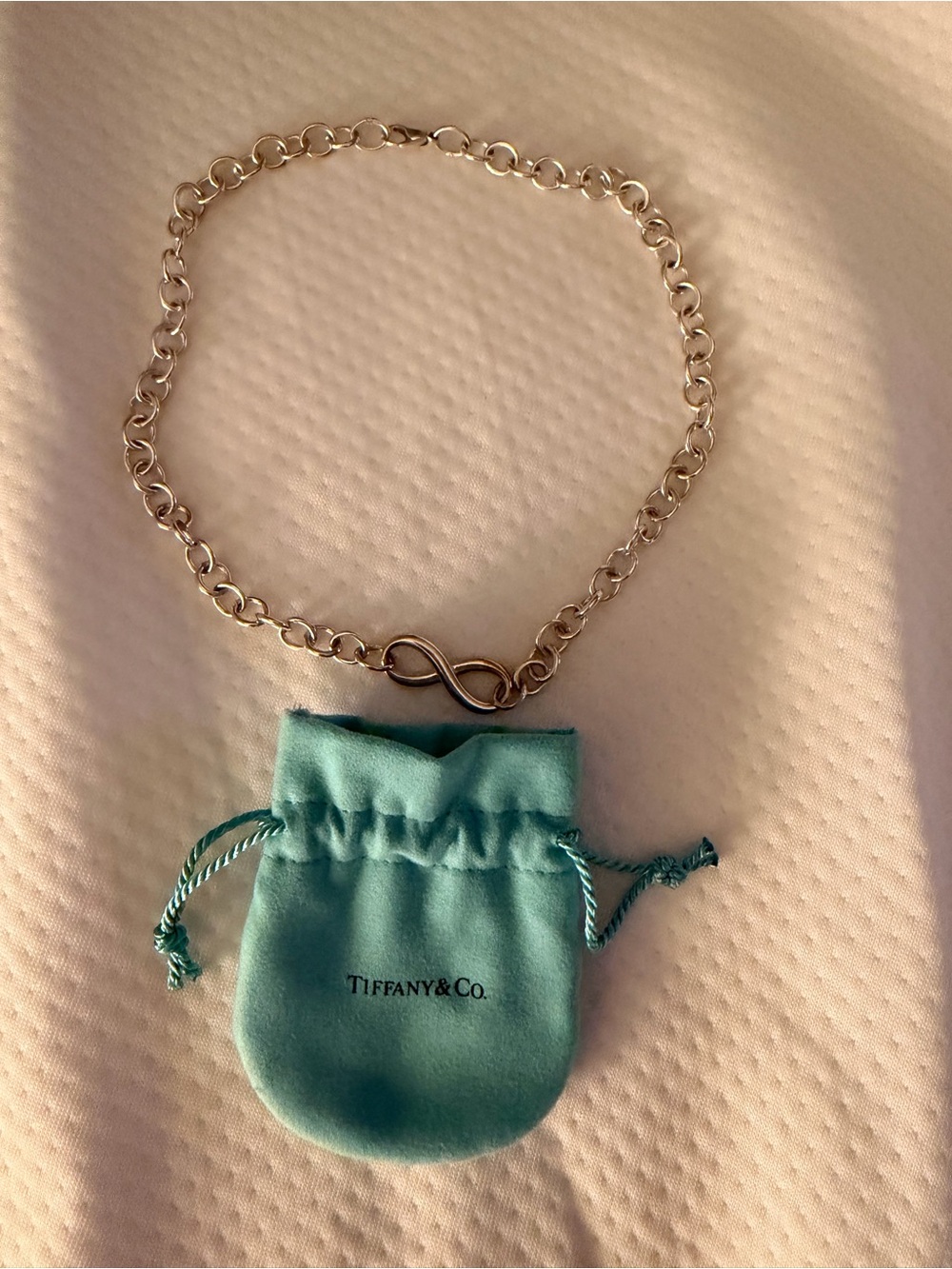 Tiffany & Co. Silver Infinity Link Bracelet with Blue Pouch